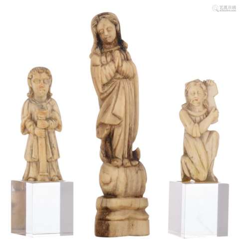 Two miniature ivory religious figures (both items …