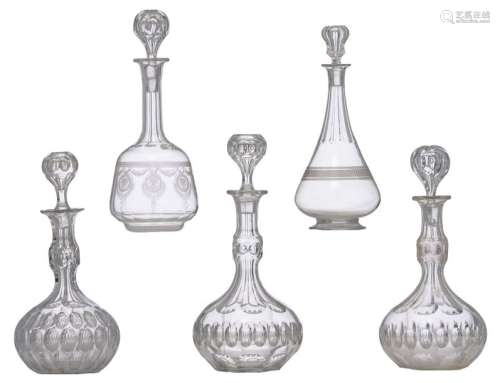 A collection of five cut crystal decanters, H 30 3…