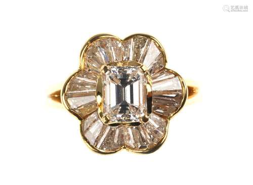 Bague en or ornée d’un diamant de taille émeraude …