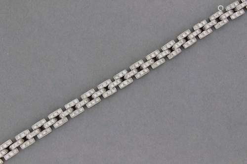 Bracelet articulé en or serti de diamants Poids br…