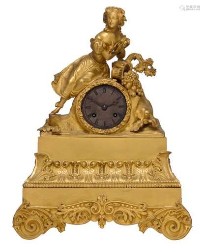 A gilt bronze mantle clock with a rural scene on t…