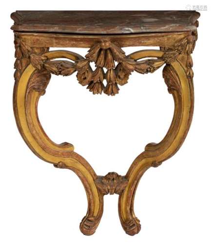 A richly sculpted Rococo gilt console with a Rouge…