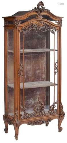 A fine Rococo style richly sculpted walnut display…