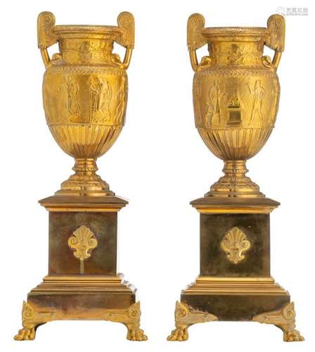 A pair of gilt, patinated and polished bronze Medi…