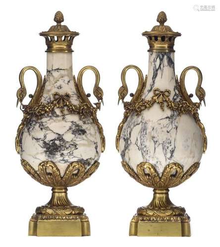 A pair of Neoclassical Carrara marble cassolettes …