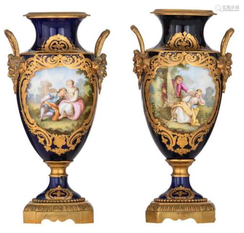 A fine pair of bleu royale ground Sèvres vases wit…