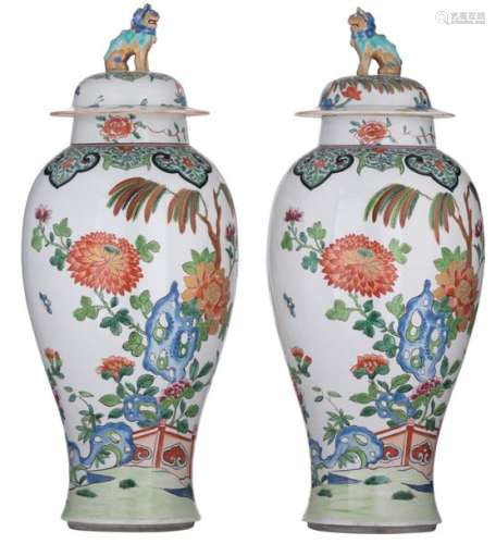 A pair of polychrome decorated Samson covered vase…