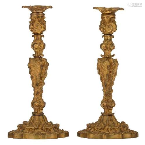 A pair of Napoleon III gilt bronze candlesticks, H…