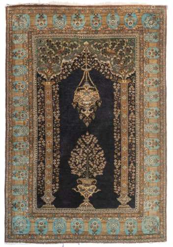 An Oriental silk prayer rug, decorated with a flow…