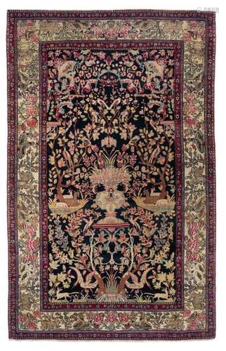 An Oriental silk and woollen Isfahan rug, the cent…