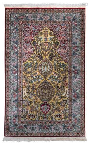 An Oriental silk rug with gold thread, decorated w…