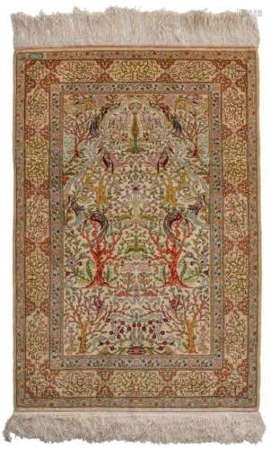 An Oriental Hereke silk and gold thread rug, decor…