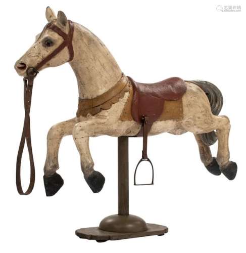 A wooden polychrome painted carousel horse mounted…