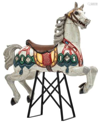 A polychrome painted carousel horse, with glass an…