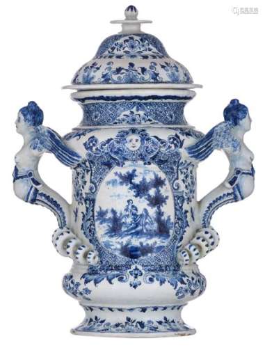 A blue and white Dutch Delftware covered vase with…