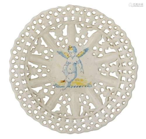 A Dutch Delftware openwork plate, the centre depic…