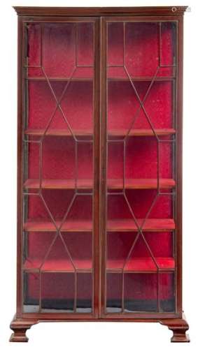 A large Edwardian rosewood display cabinet, the in…