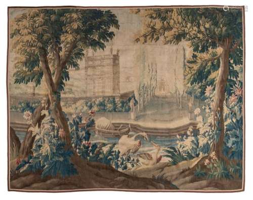 A large verdure wall tapestry, decorated with flam…