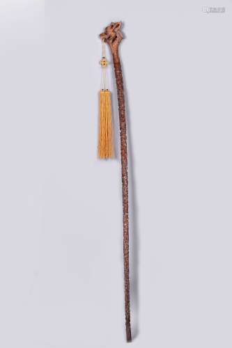 A Wooden Richly Carved Long Cane, China, Qing Dynasty.