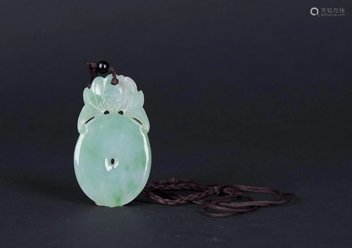 A carved Chinese Jadeite Pendant, depicting…