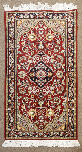 A Persian Hamadan carpet