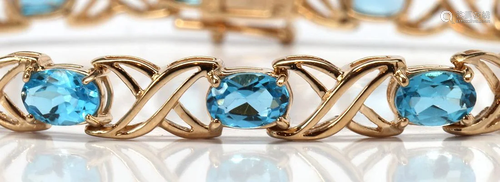 Blue topaz, 10k yellow gold bracelet