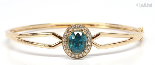 Blue zircon, diamond, 14k yellow gold…