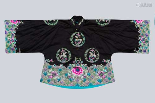 An Embroidered Black Silk Women's Robe, Qing Dynasty.