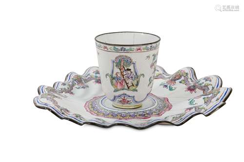 A CHINESE CANTON ENAMEL FAMILLE ROSE 'CHERRY PICKERS' CHOCOLATE CUP AND TREMBLEUSE STAND.