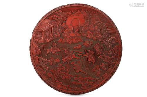 A LARGE CHINESE CINNABAR LACQUER CIRCULAR BOX AND COVER.
