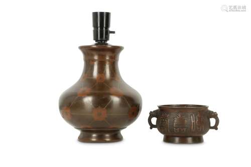 A CHINESE BRONZE INCENSE BURNER AND A SILVER-INLAID BRONZE VASE.