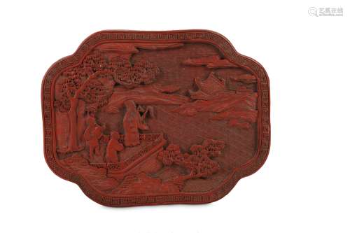 A CHINESE CINNABAR LACQUER QUATREFOIL BOX AND COVER.