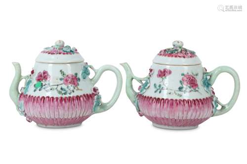 A PAIR OF CHINESE FAMILLE ROSE 'BLOSSOMS' TEAPOTS AND COVERS.