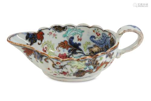 A CHINESE FAMILLE ROSE 'TOBACCO LEAF' SAUCE BOAT.