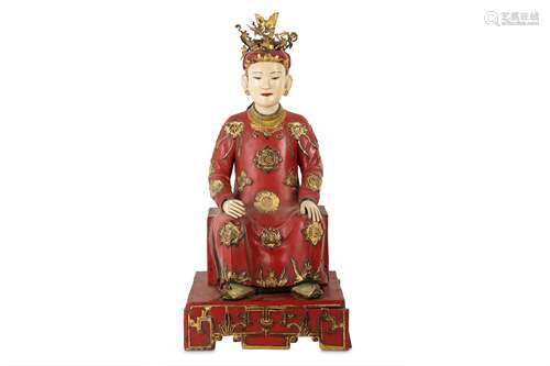 A VIETNAMESE LACQUERED WOOD FIGURE.