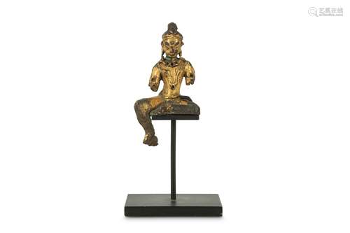 A CHINESE GILT-BRONZE FIGURE OF GREEN TARA.