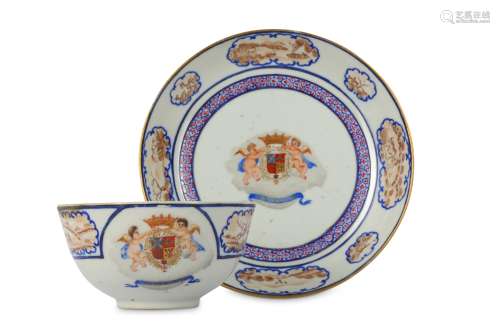 A CHINESE FAMILLE ROSE ARMORIAL TEA BOWL AND SAUCER.