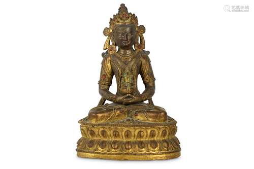 A CHINESE GILT-BRONZE FIGURE OF A BODHISATTVA..