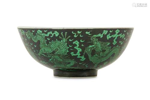 A CHINESE BLACK-GROUND GREEN 'DRAGON' BOWL.