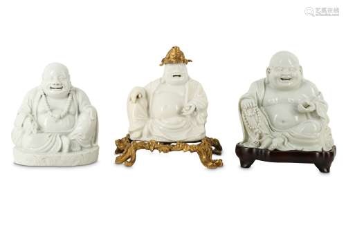 THREE CHINESE BLANC-DE-CHINE FIGURES OF BUDAI HESHANG.