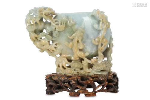 A CHINESE PALE CELADON JADE 'DRAGON' BRUSH WASHER.