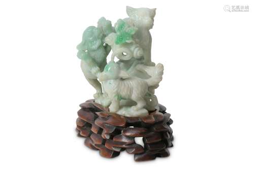 A CHINESE APPLE-GREEN JADEITE 'CAT' GROUP.