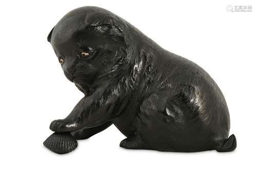 A JAPANESE BRONZE OKIMONO OF A PUPPY.