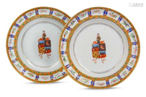 A PAIR OF CHINESE FAMILLE ROSE ARMORIAL DISHES.