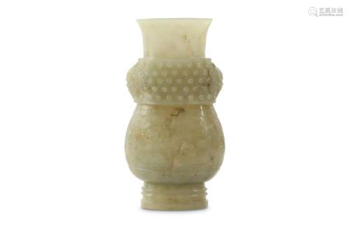 A CHINESE PALE CELADON JADE ARCHAISTIC VASE, HU.