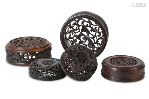 FIVE CHINESE WOOD JAR COVERS.