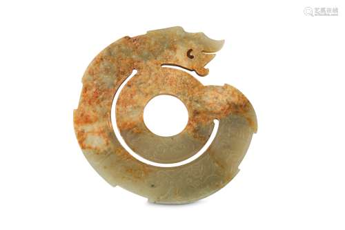 A CHINESE PALE CELADON JADE SPIRAL 'DRAGON' PLAQUE.
