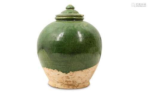 A CHINESE POTTERY GREEN-GLAZED JAR AND COVER.