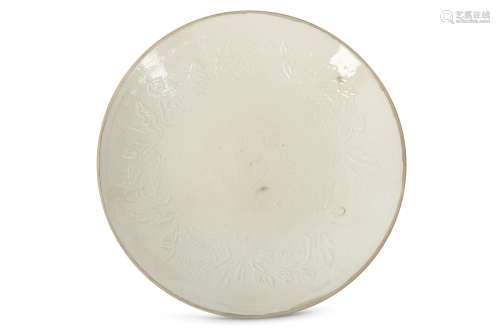A CHINESE CREAM-GLAZED 'LOTUS POND' MOULDED DISH.