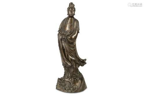 A CHINESE BRONZE SILVER-INLAID 'SHI SOU' FIGURE OF GUANYIN.